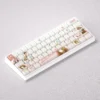 Gallery of exclusive Monogatari Nadeko Sengoku PBT dye-sub keycaps set, showcasing elegant monochromatic anime artistry and durable texture.