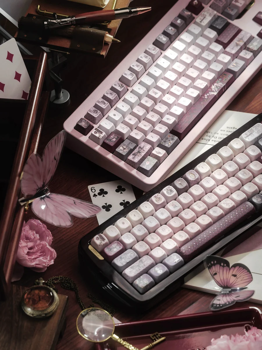 Ethereal Moth Dreams artisan keycaps set, exquisitely handcrafted, featuring intricate moth wing patterns and deep twilight hues for a dreamlike aesthetic.