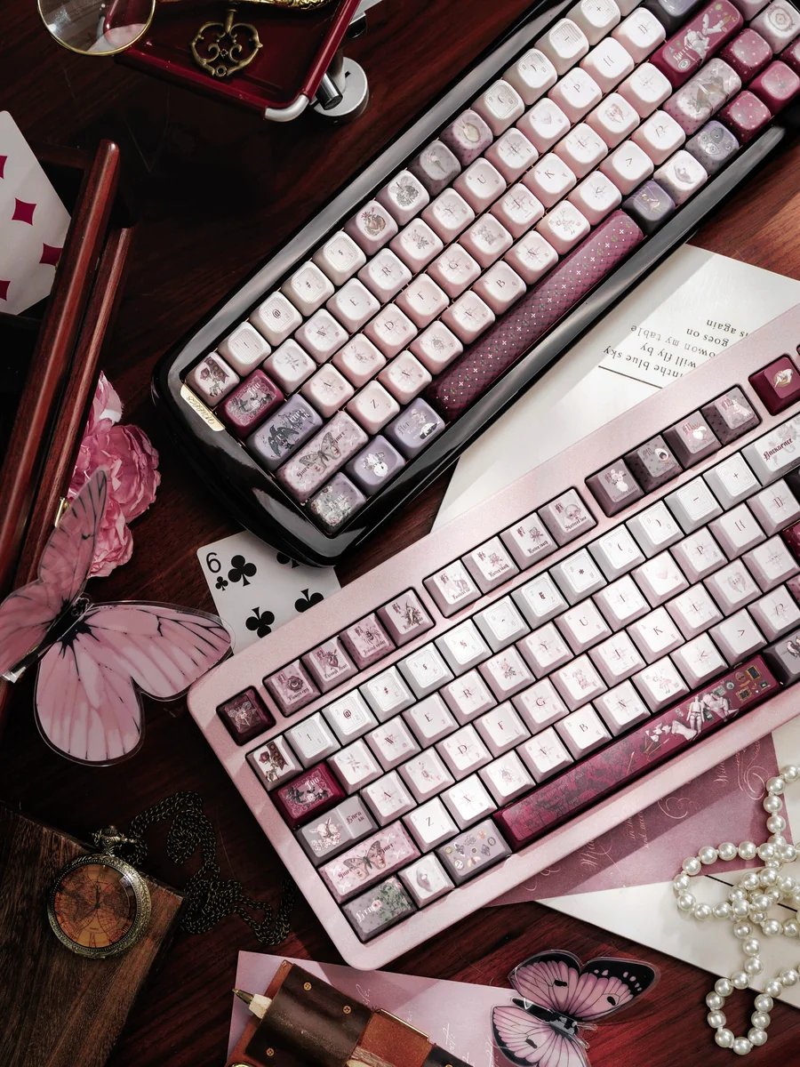 A close-up view of artisan moth keycaps set revealing ethereal wing patterns and deep twilight hues, emphasizing their exquisite dreamlike craftsmanship.