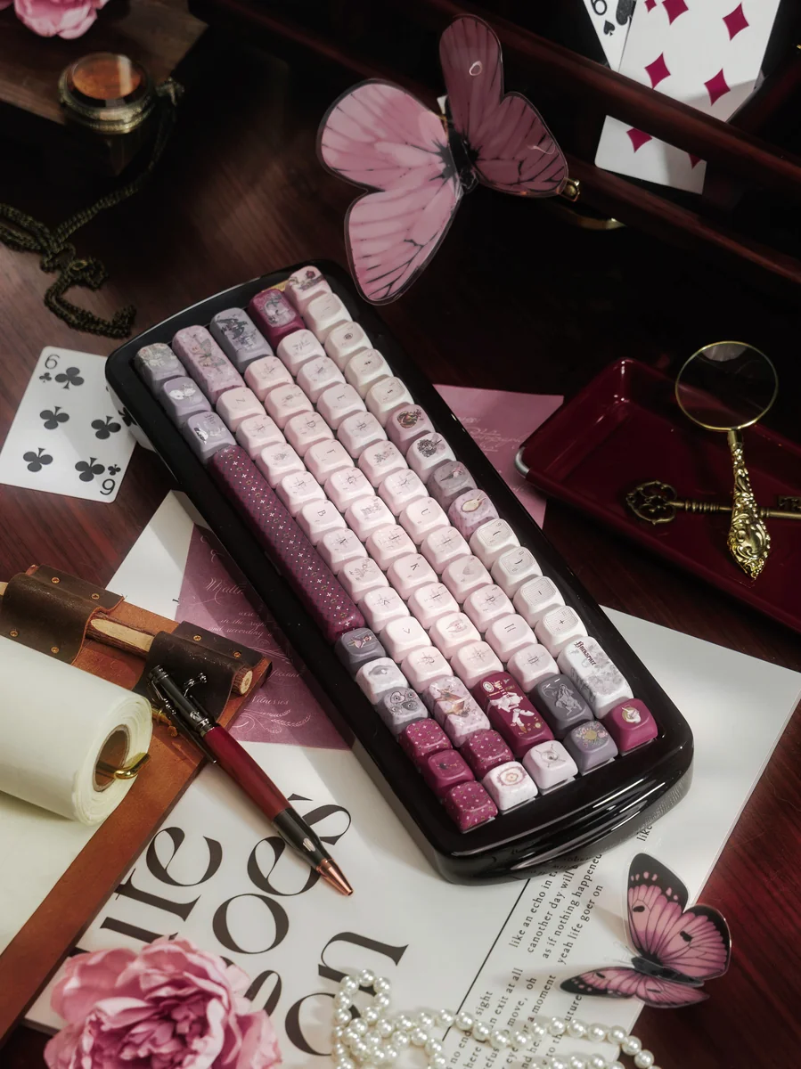 Ethereal Moth Dreams artisan keycap set showcasing intricate moth wing patterns and deep twilight hues from various angles, highlighting exquisite crafted design.