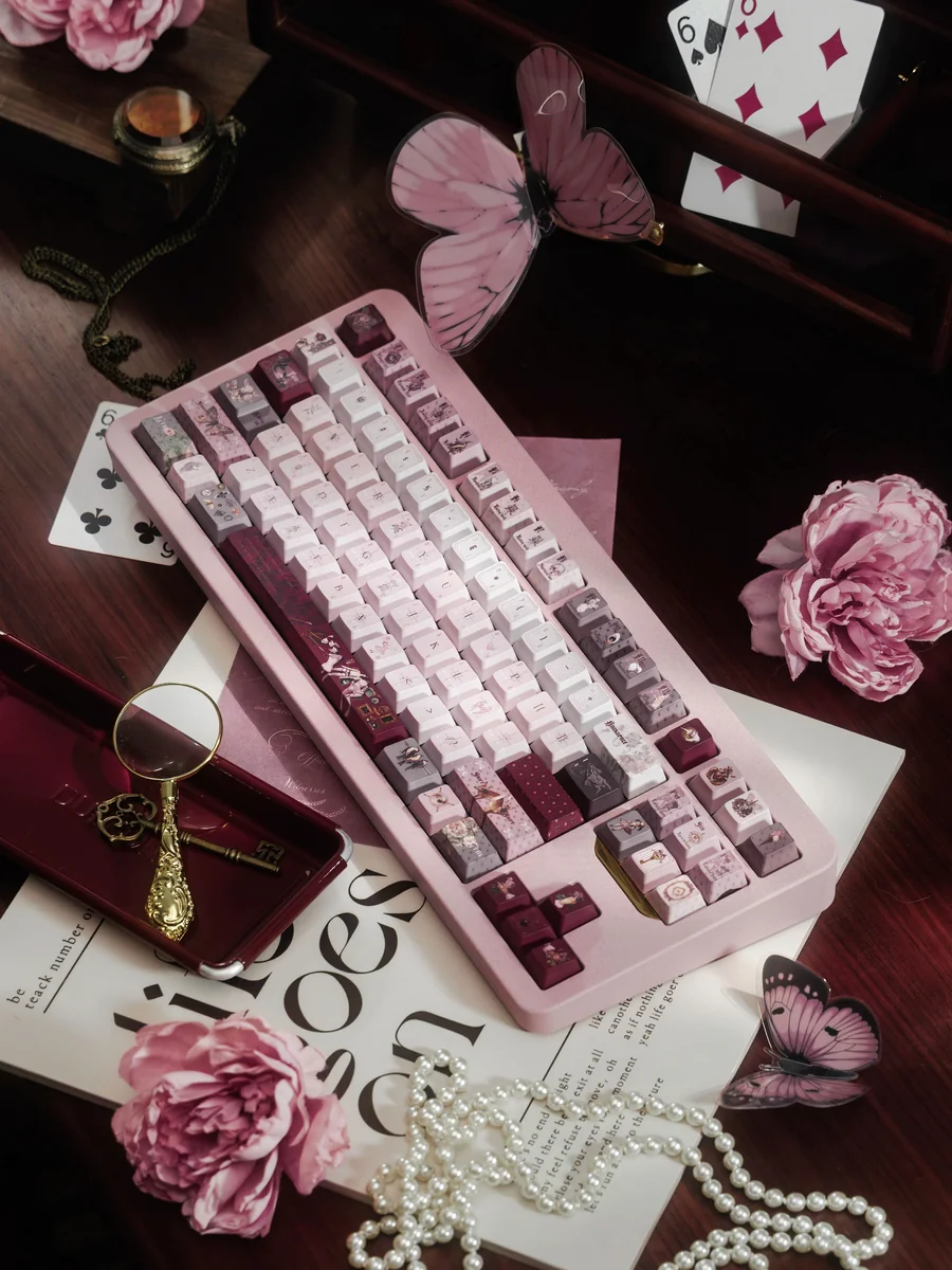 Ethereal Moth Dreams artisan keycap set displayed from various angles, revealing intricate moth wing patterns, deep twilight hues, and exquisite craftmanship.