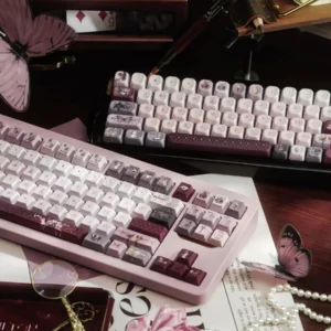 Ethereal Moth Dreams artisan keycap set showcasing intricate moth wing patterns in deep twilight hues. Exquisite, handcrafted moth keycaps.