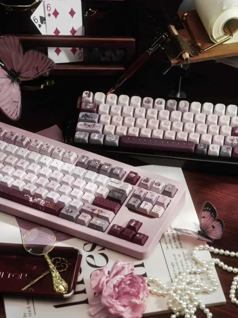 Ethereal Moth Dreams artisan keycap set showcasing intricate moth wing patterns in deep twilight hues. Exquisite, handcrafted moth keycaps.