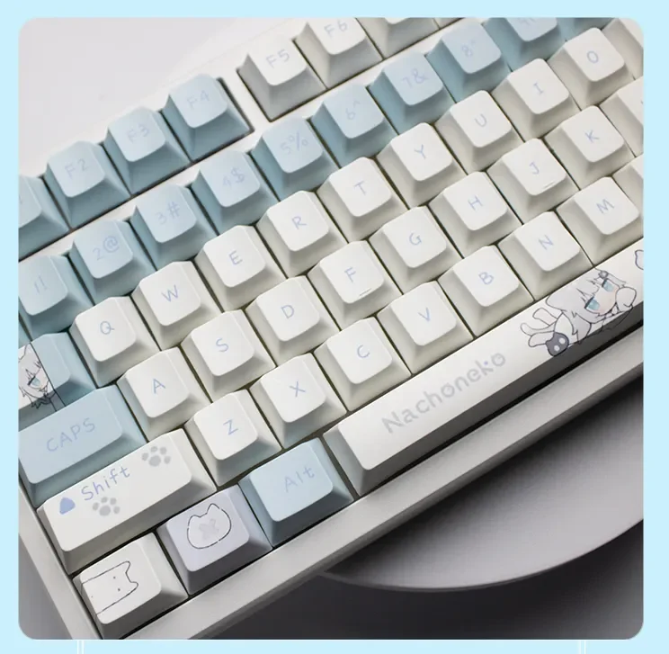 Gallery of Nachoneko keycaps with charming anime feline designs for fans. Durable PBT setup.