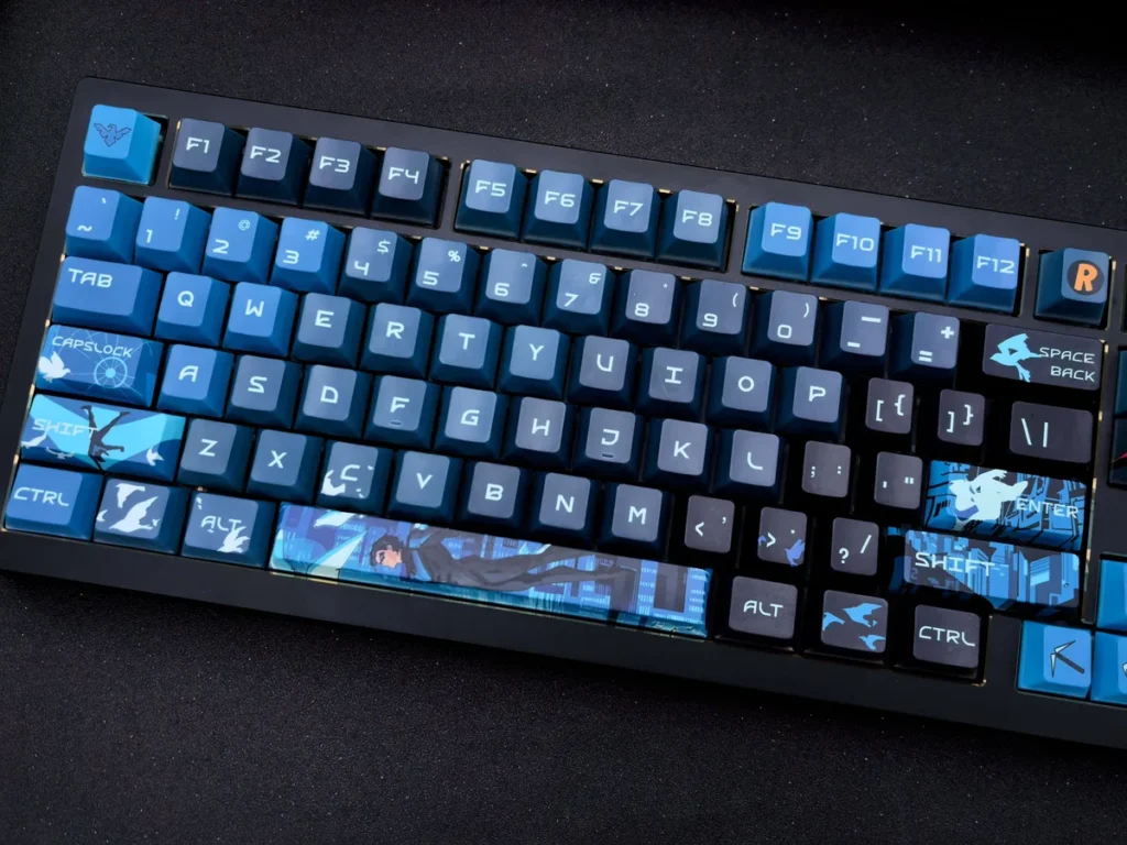 Exclusive Nightwing Spirit Artisan Keycap Set in sleek dark blue and black, highlighting the iconic emblem for a premium custom keyboard setup.