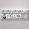 Artistic Nishimiya Shoko keycaps set, showcasing delicate A Silent Voice anime scenes and Shokos expressions on durable PBT dye-sub Cherry profile keys.