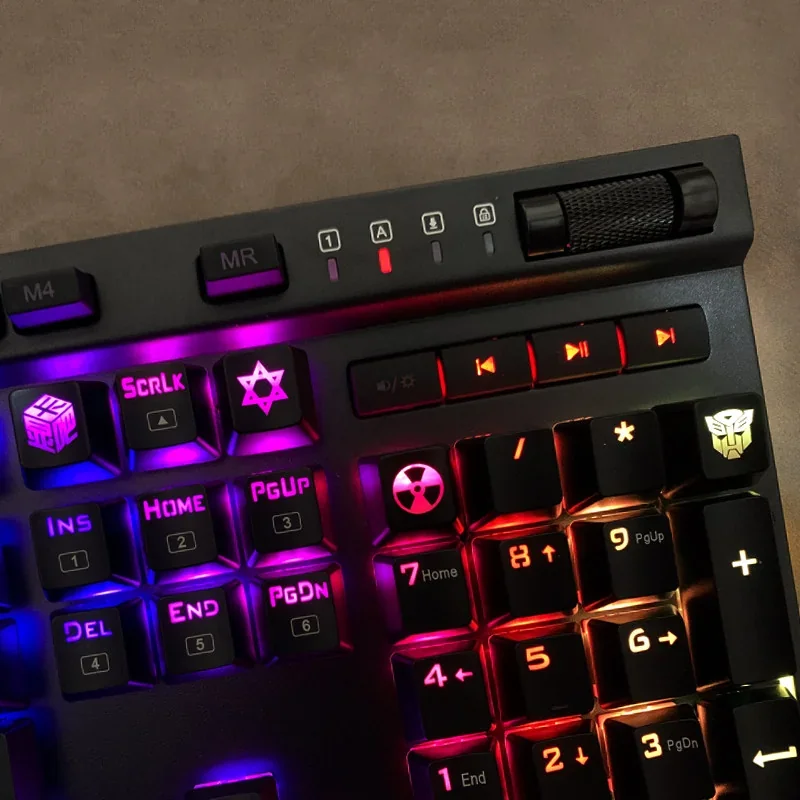 Detailed Optimus Prime mechanical keycap glowing with backlight, showcasing its intricate sculpt and iconic Transformers design from a dynamic angle.