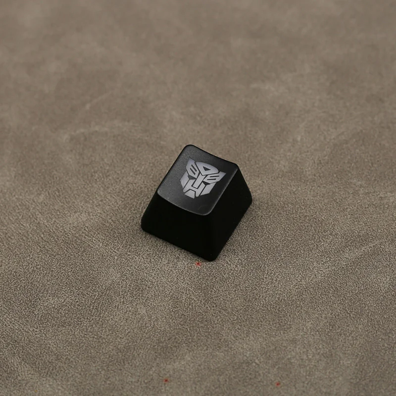 Optimus Prime backlit mechanical keycap gallery showcasing the highly detailed sculpt from various angles, highlighting its iconic Transformers aesthetics.