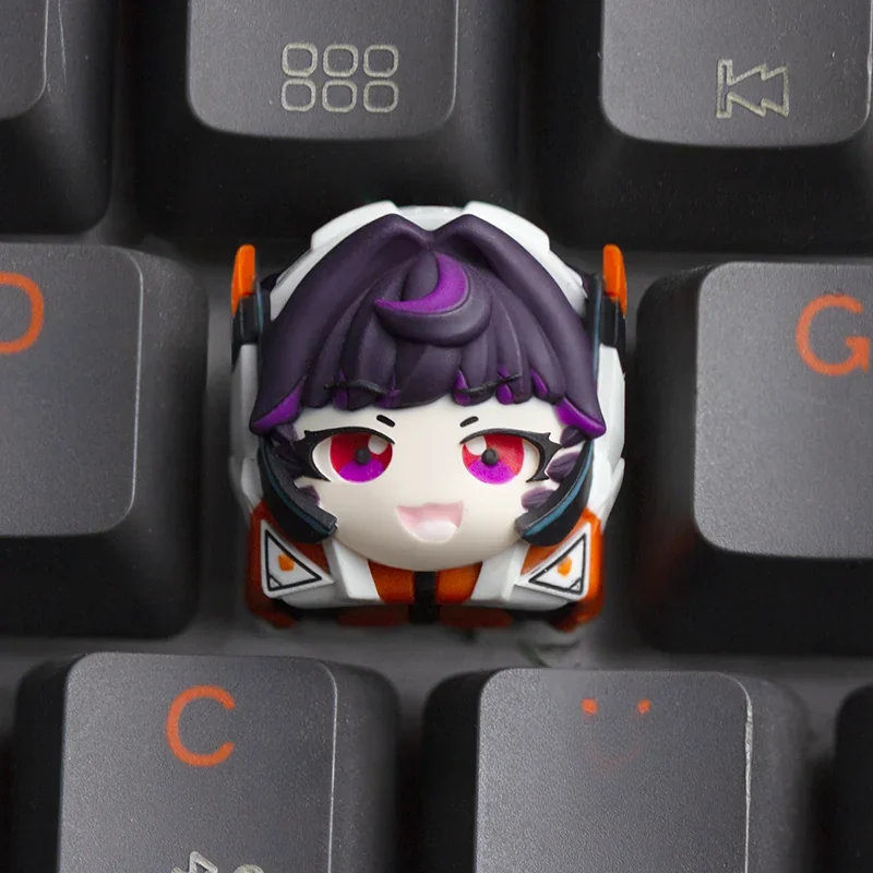 Multiple angles of the handcrafted Overwatch Juno resin artisan keycap, revealing its vibrant, detailed sculpt and tactile artistry.