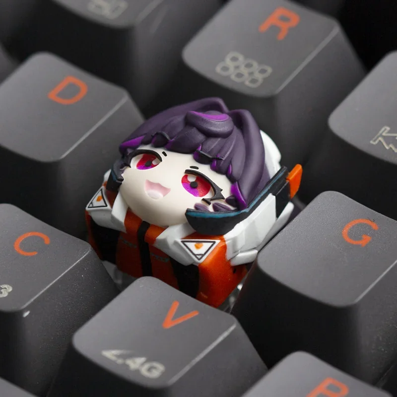 Multiple angles of a vibrant, handcrafted Overwatch Juno resin artisan keycap, showcasing its detailed sculpt and artistic gaming aesthetic.