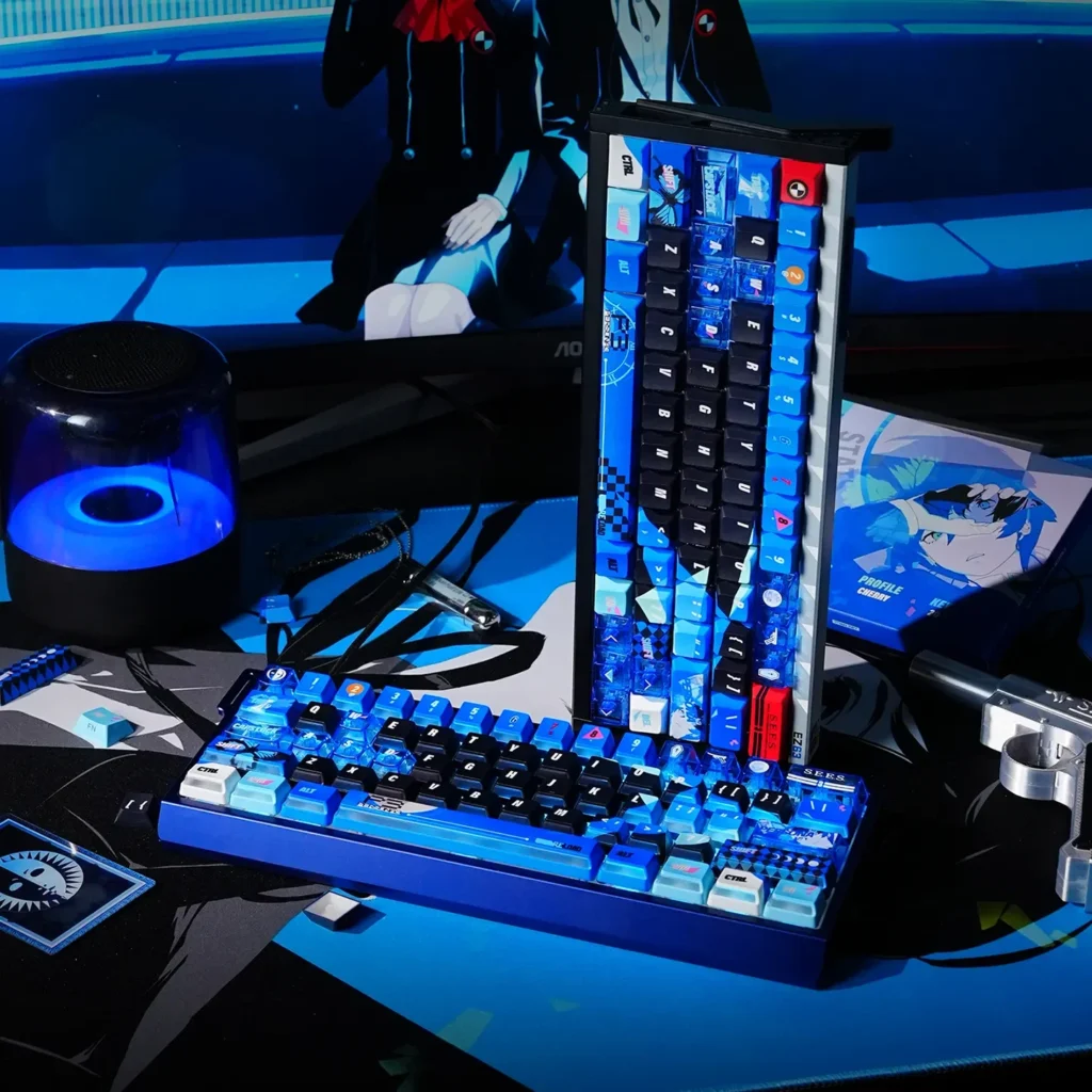 Gallery of P3R keycaps set showcasing exclusive Persona 3 Reload dye-sublimation PBT set in vibrant nuclear blue with dynamic side-lit glow.