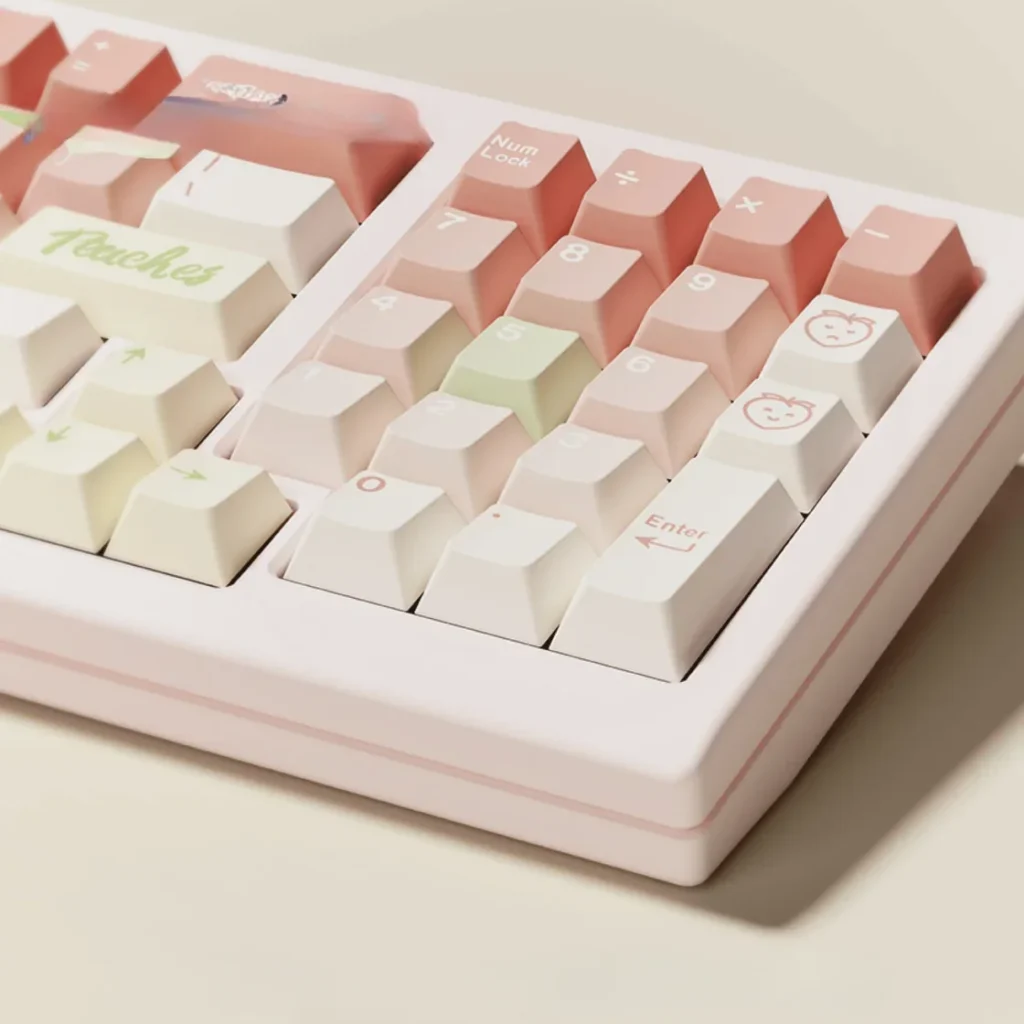 Playful peach pink keycaps set, showcasing the soft aesthetic and durable dye-sub PBT from various angles, creating a cozy vibe.