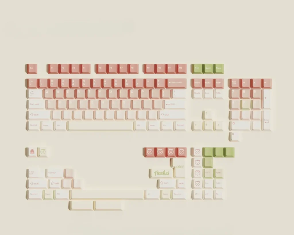 Gallery views of the soft peach pink dye-sub PBT keycap set, highlighting its gentle, fluffy aesthetic and durable quality from multiple angles.