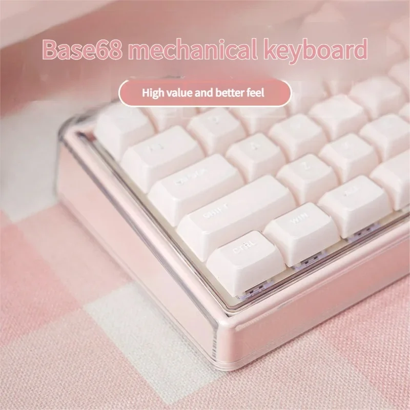 Elegant pink mechanical keyboard showcasing its sleek wireless design and soft matte finish from multiple angles, highlighting its silent typing aesthetics.