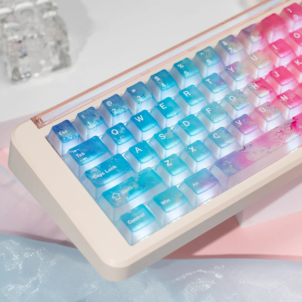 Artistic views of Luminous Pink Ocean PC Keycaps Set, highlighting their ethereal pink gradient and translucent PC build, perfectly diffusing vibrant RGB glow.