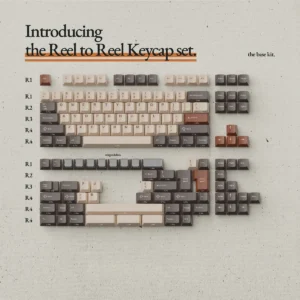 Artistic Reel to Reel Keycap Set displaying exquisite vintage audio charm, inspired by classic tape recorders with intricate retro designs.