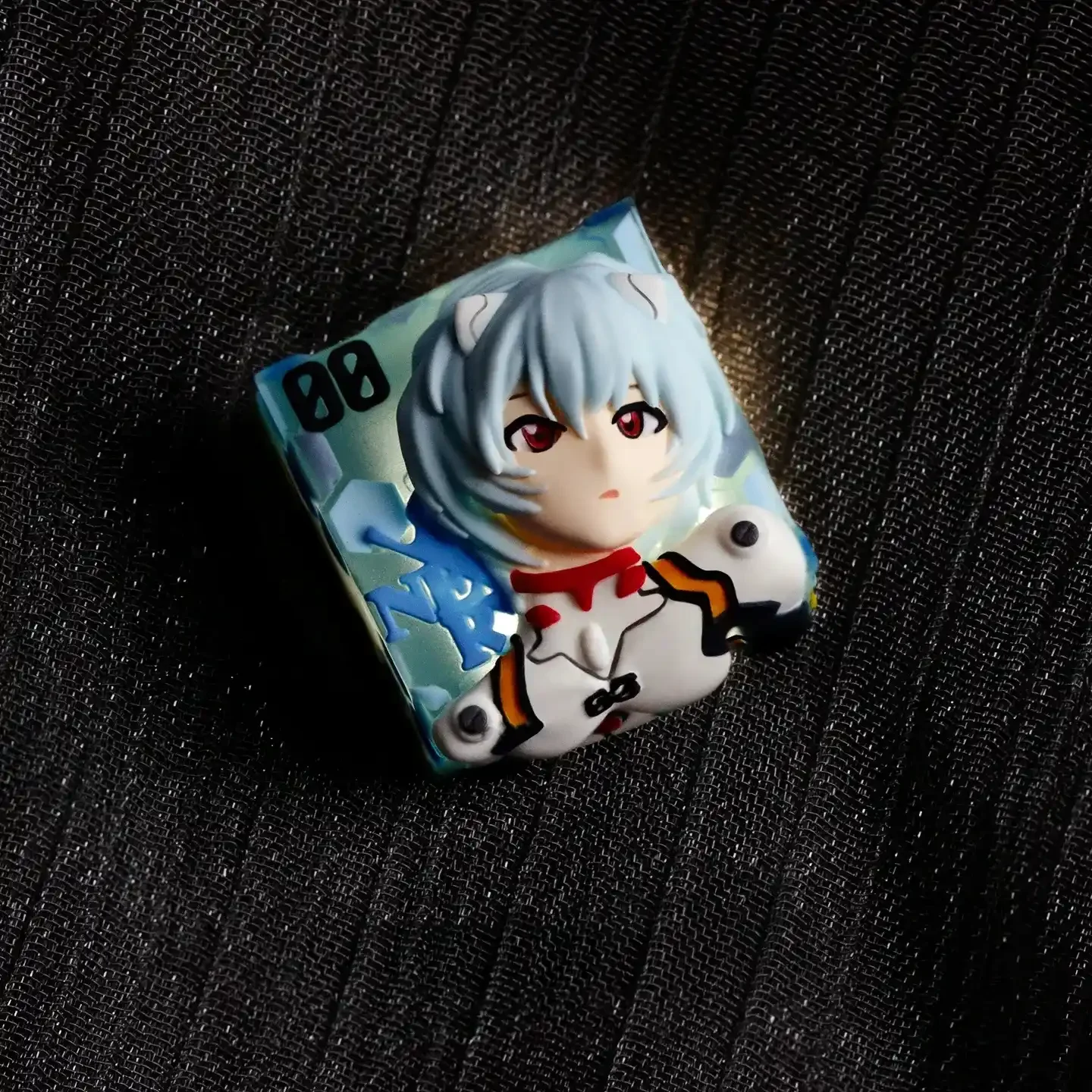 Ethereal Rei Ayanami translucent resin keycap gallery, highlighting its intricate custom design and subtle glow for mechanical keyboards.