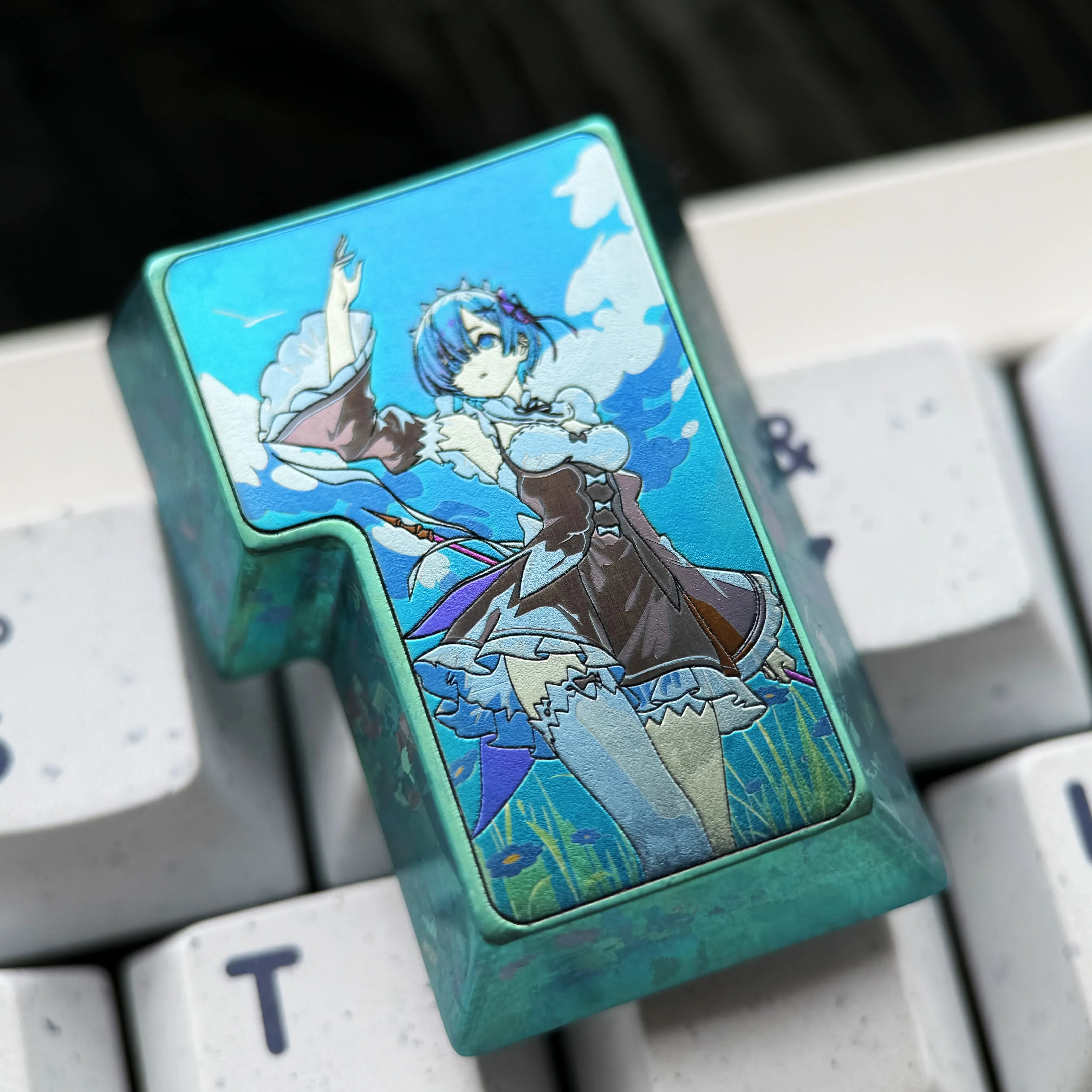 Detailed views of the exclusive Rem Titanium Alloy Enter keycap, featuring vibrant Re:Zero anime character art and a polished, premium finish.