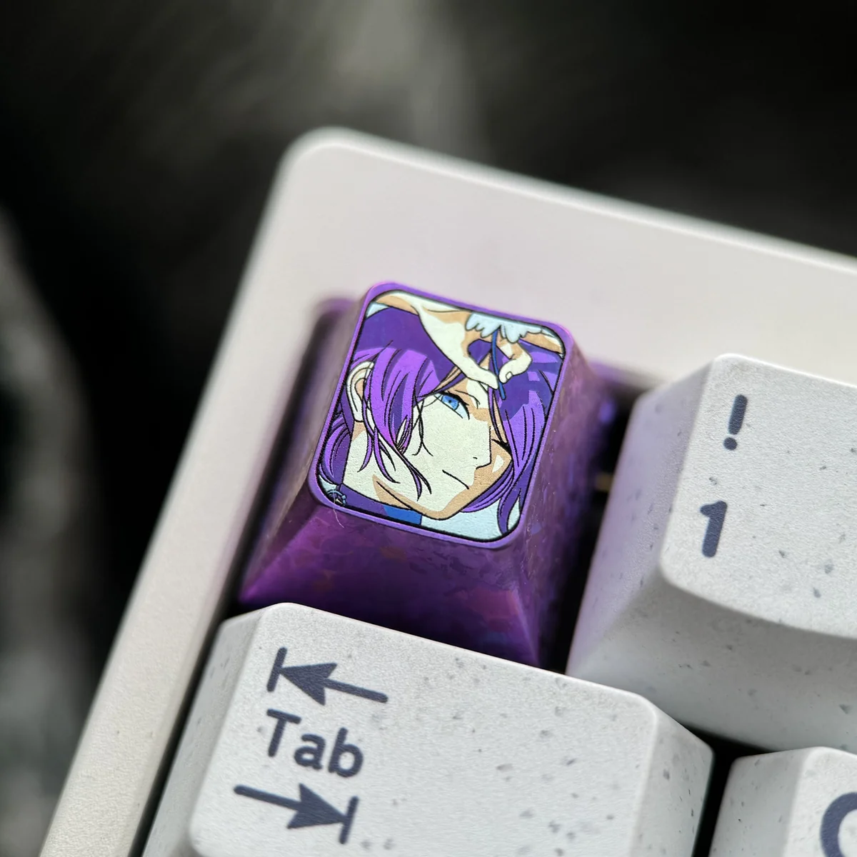 Premium Reze titanium keycap showcasing detailed Chainsaw Man anime art with explosive purple ice crystals on its polished surface.