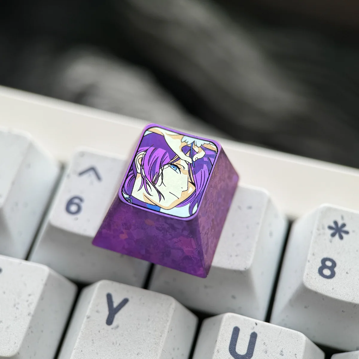 Premium Reze Titanium Keycap with explosive purple ice crystal and Chainsaw Man art on polished titanium alloy, shown from various views.