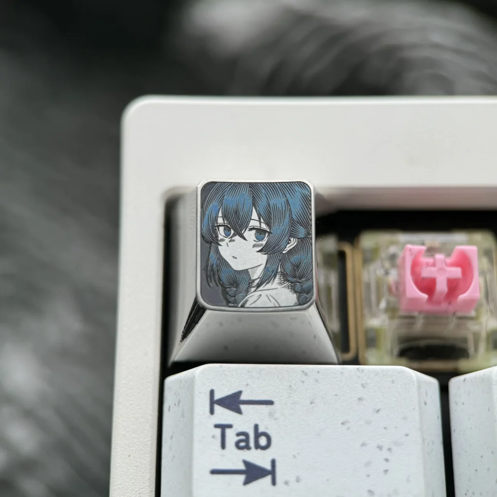 Gallery views of the Roxy Titanium Keycap, highlighting its precision-carved anime art, polished titanium finish, and intricate details from various angles.