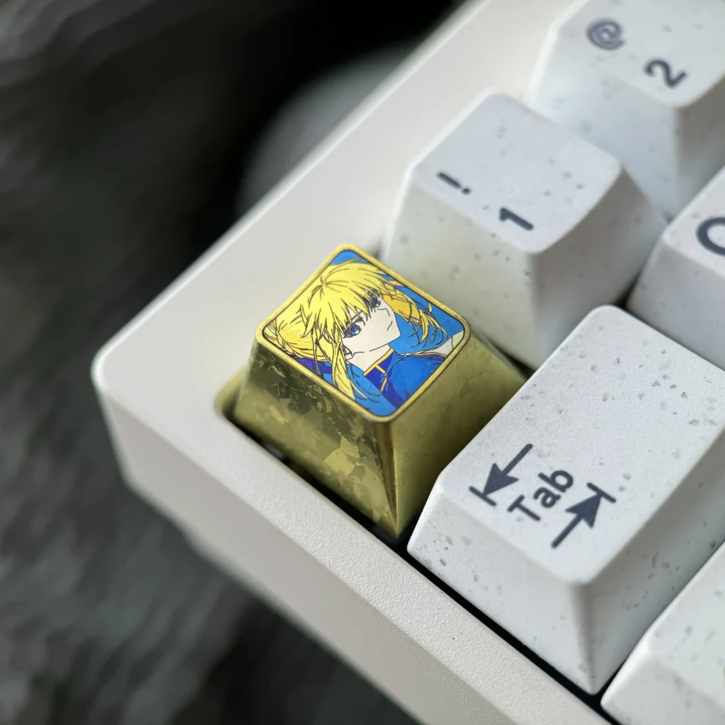 Collection of vibrant Saber titanium alloy keycaps, showcasing artisan anime design and anodized finish from multiple angles for mechanical keyboards.