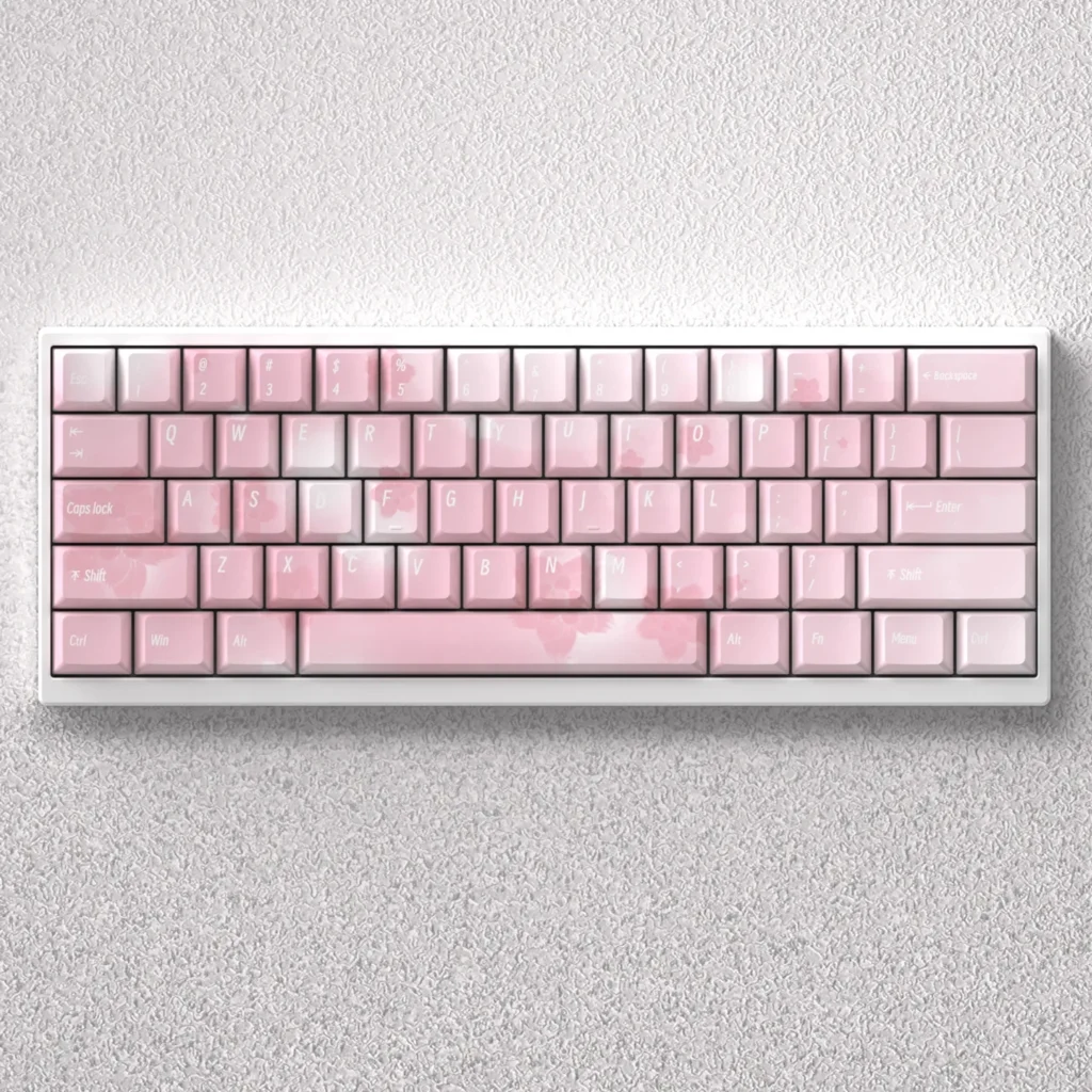 Elegant Sakura PBT dye-sub keycaps set featuring exquisite five-sided cherry blossom designs. Durable, serene, and artistic Japanese floral set.