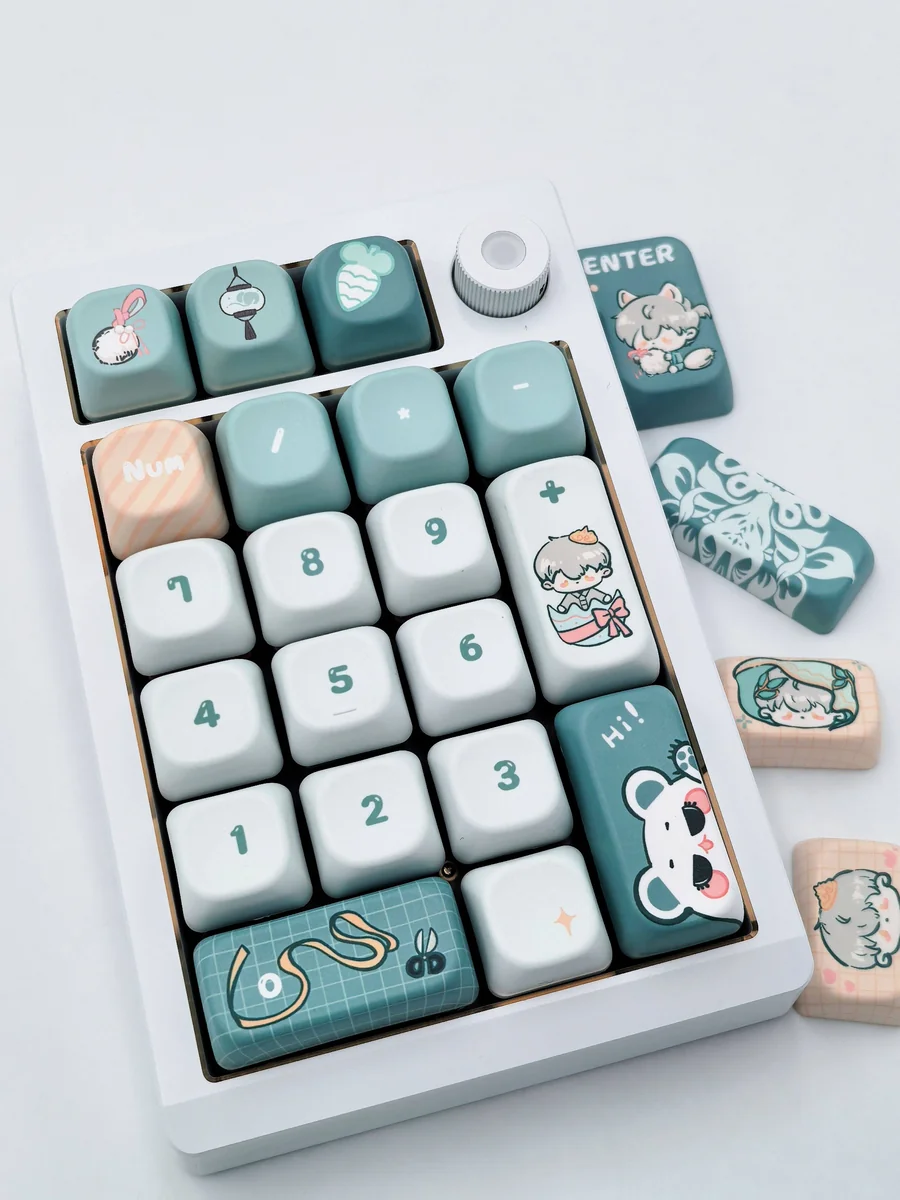 Detailed view of the Sariel FOA Keycap Set, displaying exclusive character-themed legends, serene cool tones, and intricate motifs.