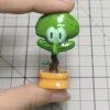 Whimsical Squidward Potted Plant artisan keycap from a new angle, revealing its unique handcrafted resin details.