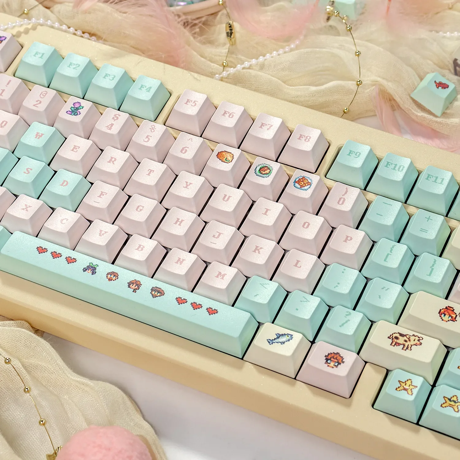 Multiple angles of the Stardew Valley R2 pixel art keycaps set, displaying vibrant, charming, and nostalgic game scenes. PBT dye-sub custom keycaps.