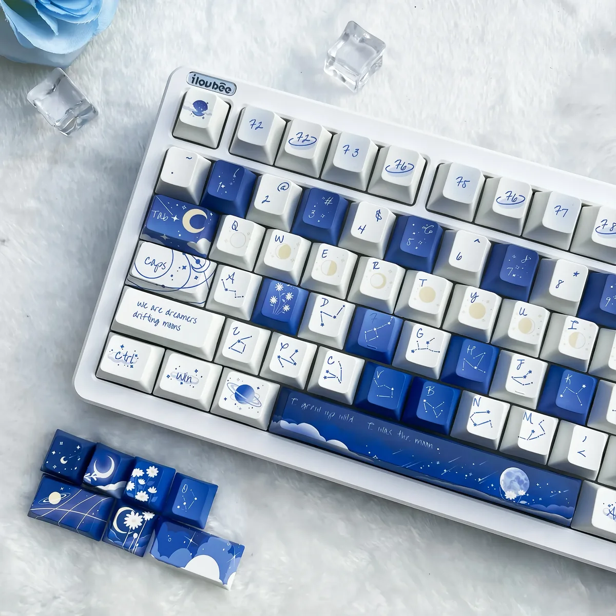 Starry Keycap Set for mechanical keyboards, featuring durable PBT spherical keycaps with a deep blue cosmic design and twinkling stars.