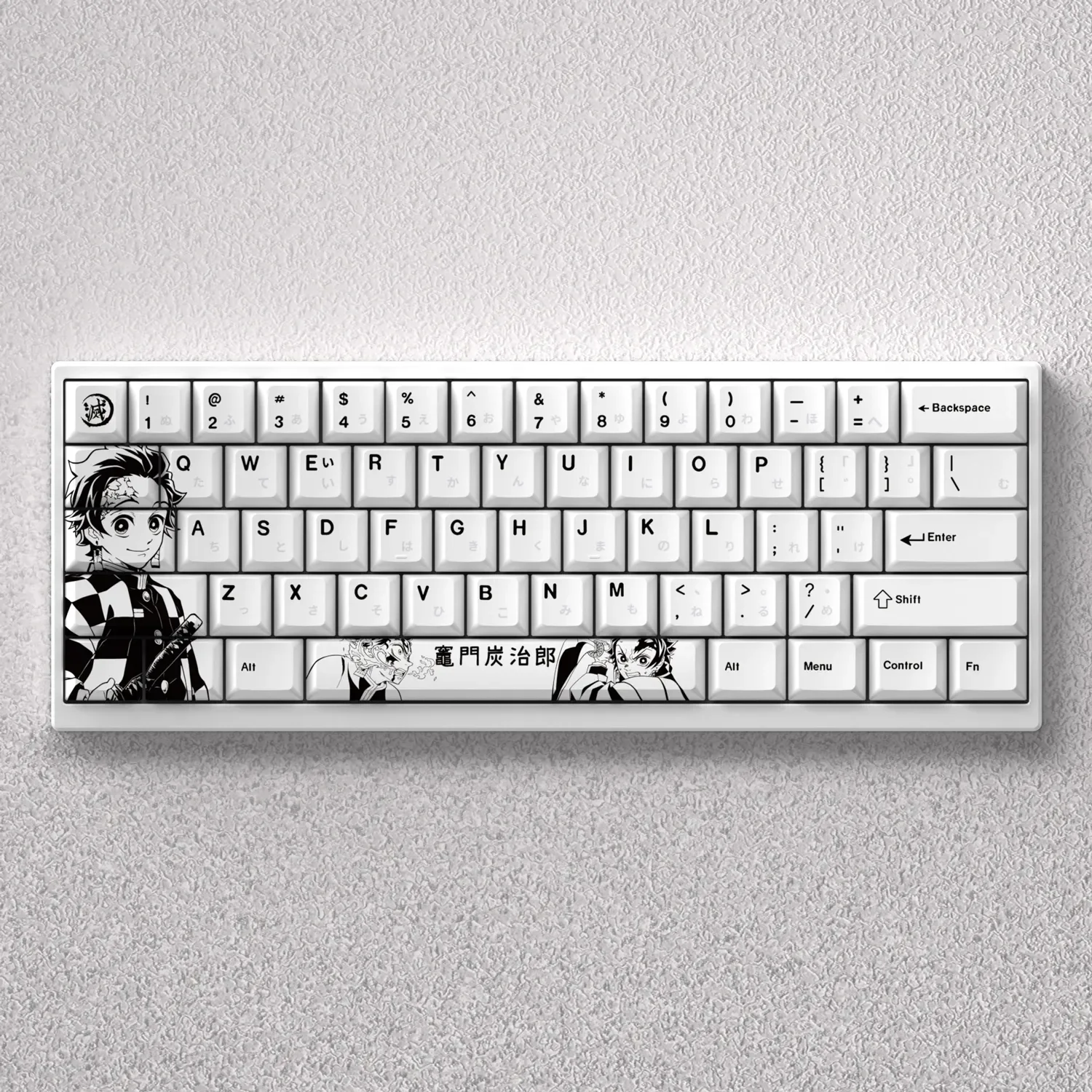 A comprehensive product gallery of the iconic Demon Slayer Tanjiro Keycap Set, highlighting its vibrant, engraved anime artwork and premium finish.