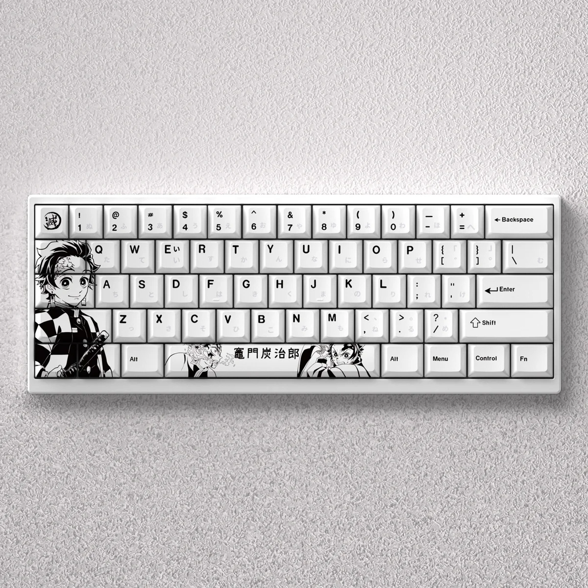 A comprehensive product gallery of the iconic Demon Slayer Tanjiro Keycap Set, highlighting its vibrant, engraved anime artwork and premium finish.