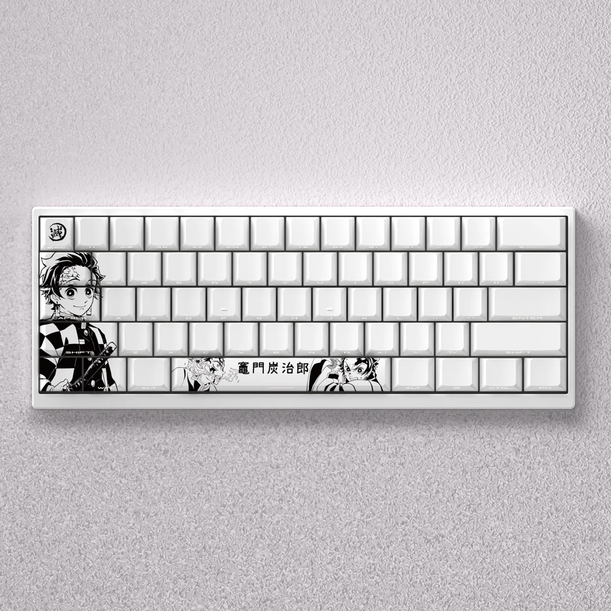 Vibrant Demon Slayer Tanjiro Keycap Set from multiple angles, showcasing the iconic anime design and engraved details on custom mechanical keycaps.