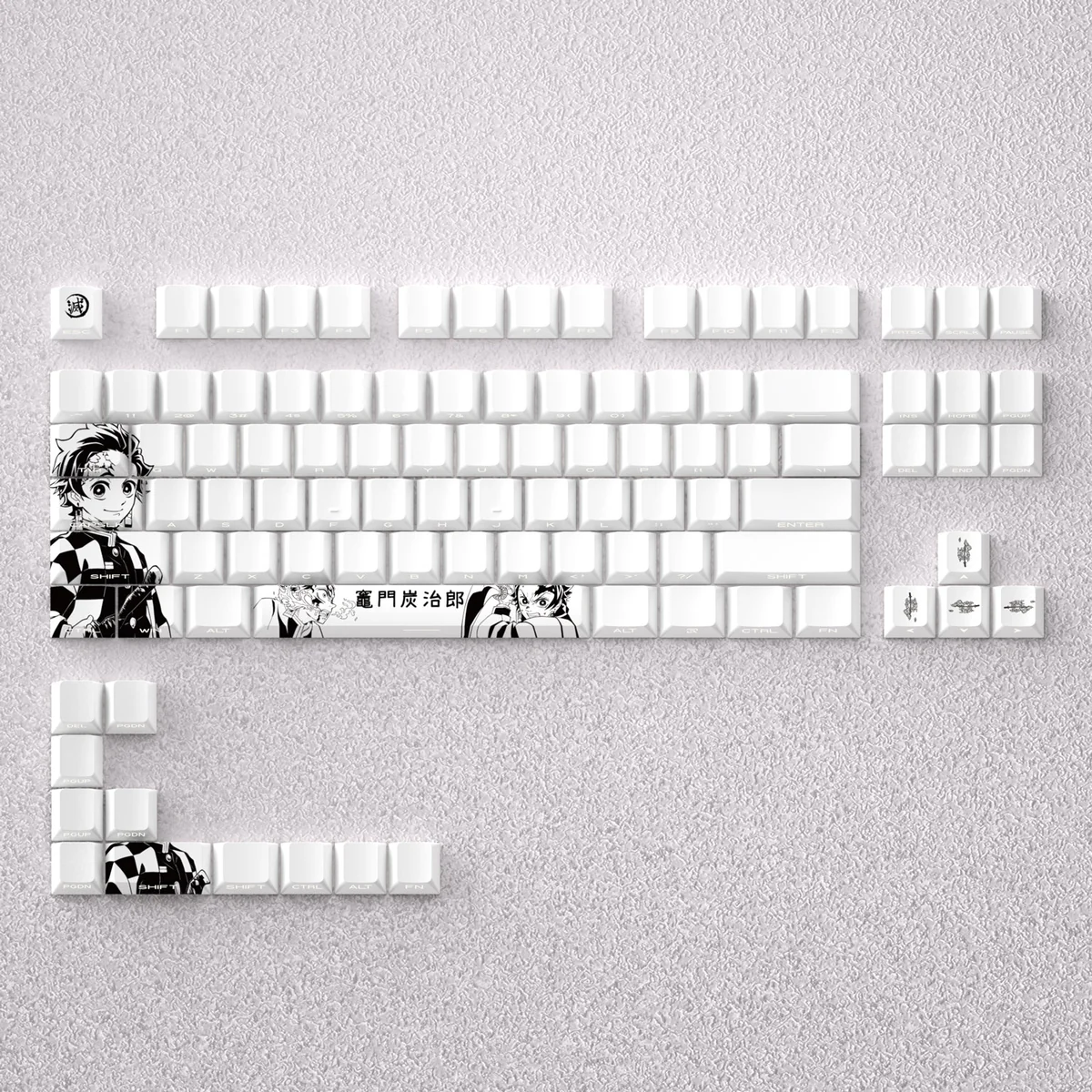 Vibrant Demon Slayer Tanjiro Keycap Set displayed, featuring iconic Tanjiro Kamado with finely engraved, anime-inspired details for custom keyboard.