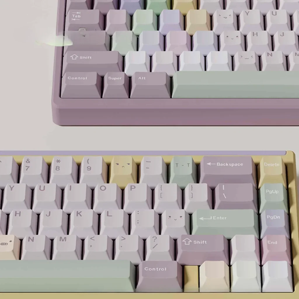 Close-up of unique Taro Pistachio PBT Keycaps set, a sweet pastel delight in purple, green, and cream, showcasing their whimsical dessert theme.