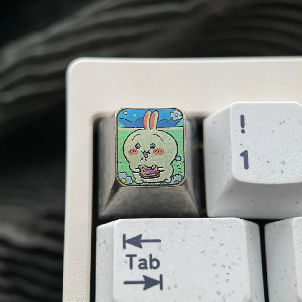 Gallery of Premium Titanium Anime Usagi ESC keycap, displaying its whimsical design, vibrant metallic finish, and artistic craftsmanship.