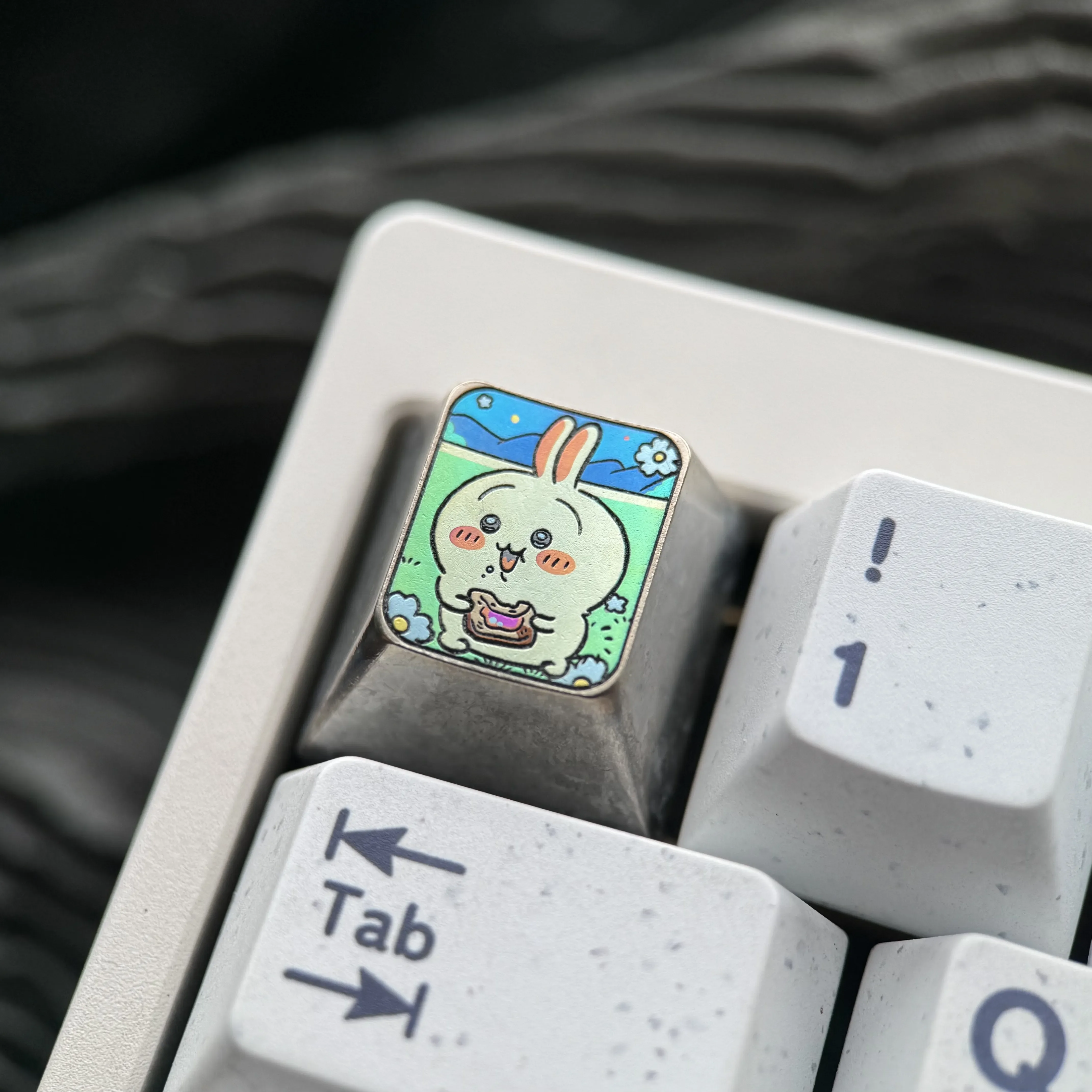 Premium Titanium Anime Usagi ESC keycap gallery: showcasing its whimsical design, vibrant colors, and metallic finish from multiple artistic angles.