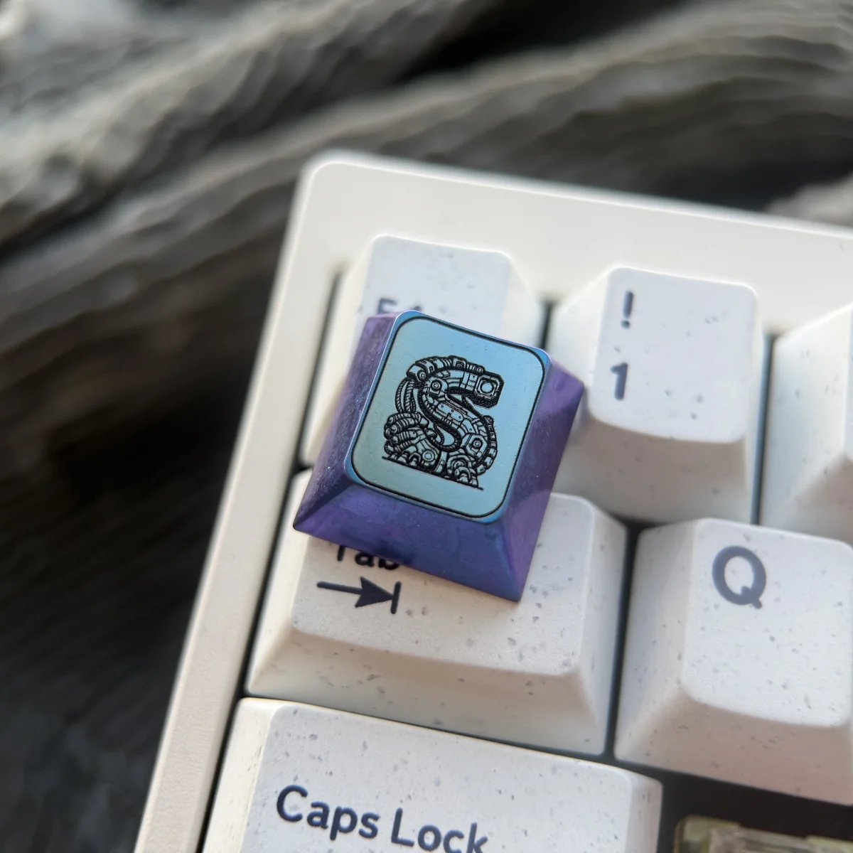 Premium Titanium Gundam WASD gaming keycaps displayed from various angles, highlighting their futuristic design and vibrant anodized finish.