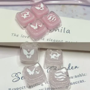 Enchanting pink translucent Valorant Keycaps with shimmering glitter, showcasing skill keys for mechanical keyboards.