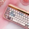 Velvet frosted strawberry keycaps set displayed from various artistic angles, showcasing their translucent PBT+PC material and whimsical, ethereal glow.