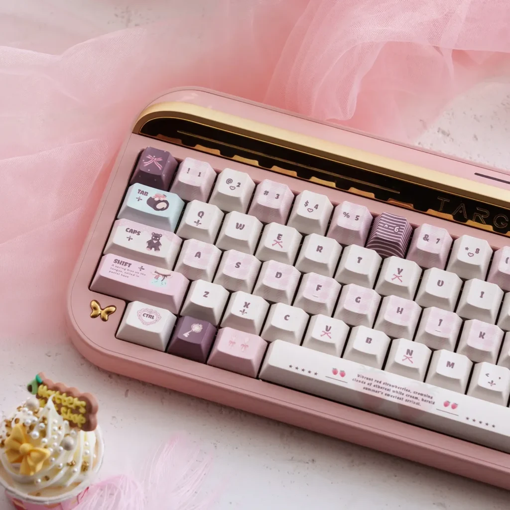 A collection of Velvet Frosted Strawberry PBT+PC translucent keycaps set shown from various angles, highlighting their sweet design and ethereal glow.