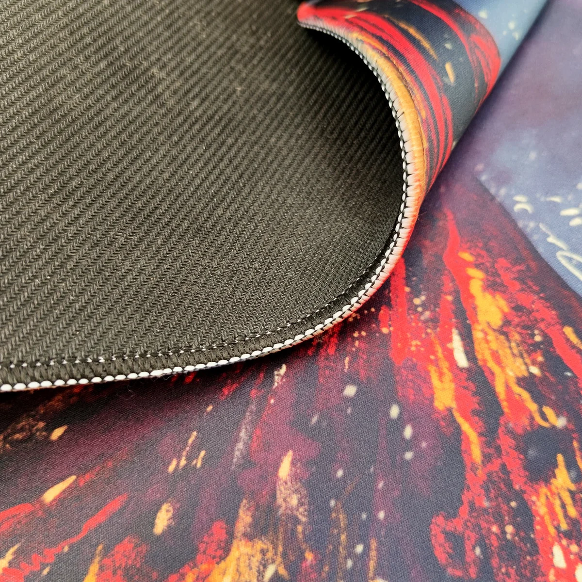 Gallery views of the large Volcano Gaming Desk Mat, showcasing its immersive fiery volcanic design, molten lava, and dramatic geological power.