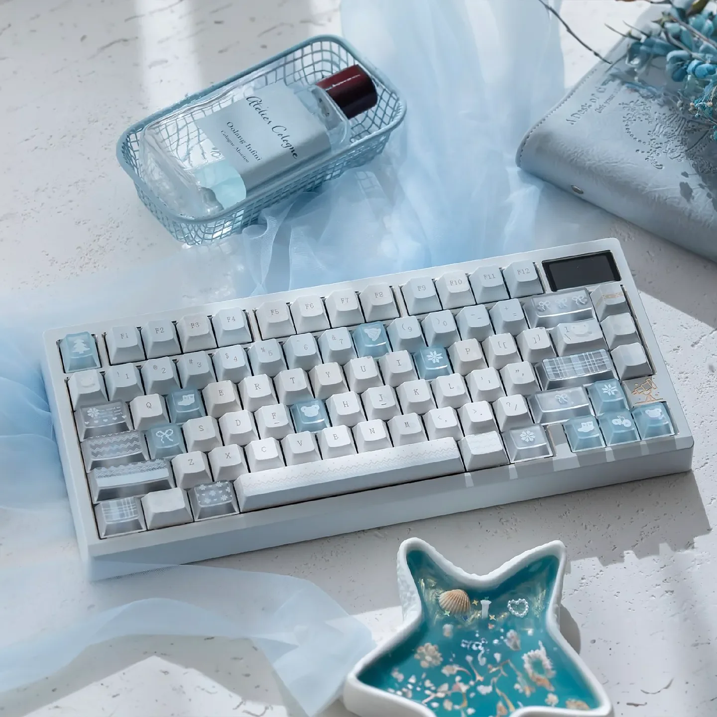 Full Winter Letter Keycaps set, displaying the unique PBT+PC dye-sublimation design. Soft blue and white snow letters create a tranquil, artistic design.