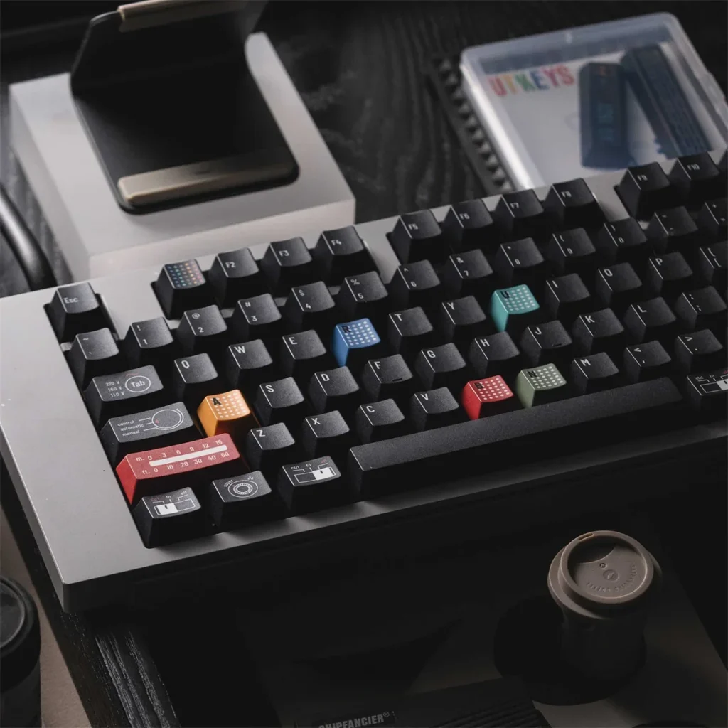 Detailed view of Ag1921 Braun-inspired PBT Wooting keycaps set, highlighting their sleek dark aesthetic, precise legends, and premium minimalist design.