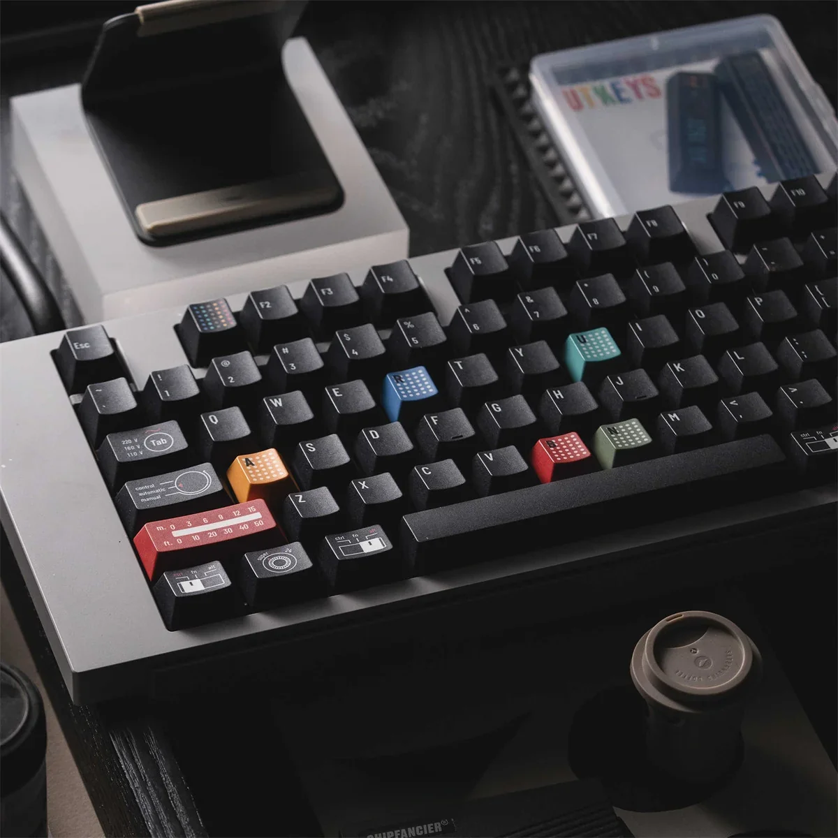 Detailed view of Ag1921 Braun-inspired PBT Wooting keycaps set, highlighting their sleek dark aesthetic, precise legends, and premium minimalist design.