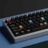 Ag1921 Braun-inspired PBT Wooting keycaps set in a gallery, shown their sleek minimalist industrial design, dark tones, and precise legends.