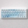 Yuki-onna Keycaps Set: Ethereal PBT Keycap Set showcasing the mystical snow maiden design in delicate icy blues and whites.