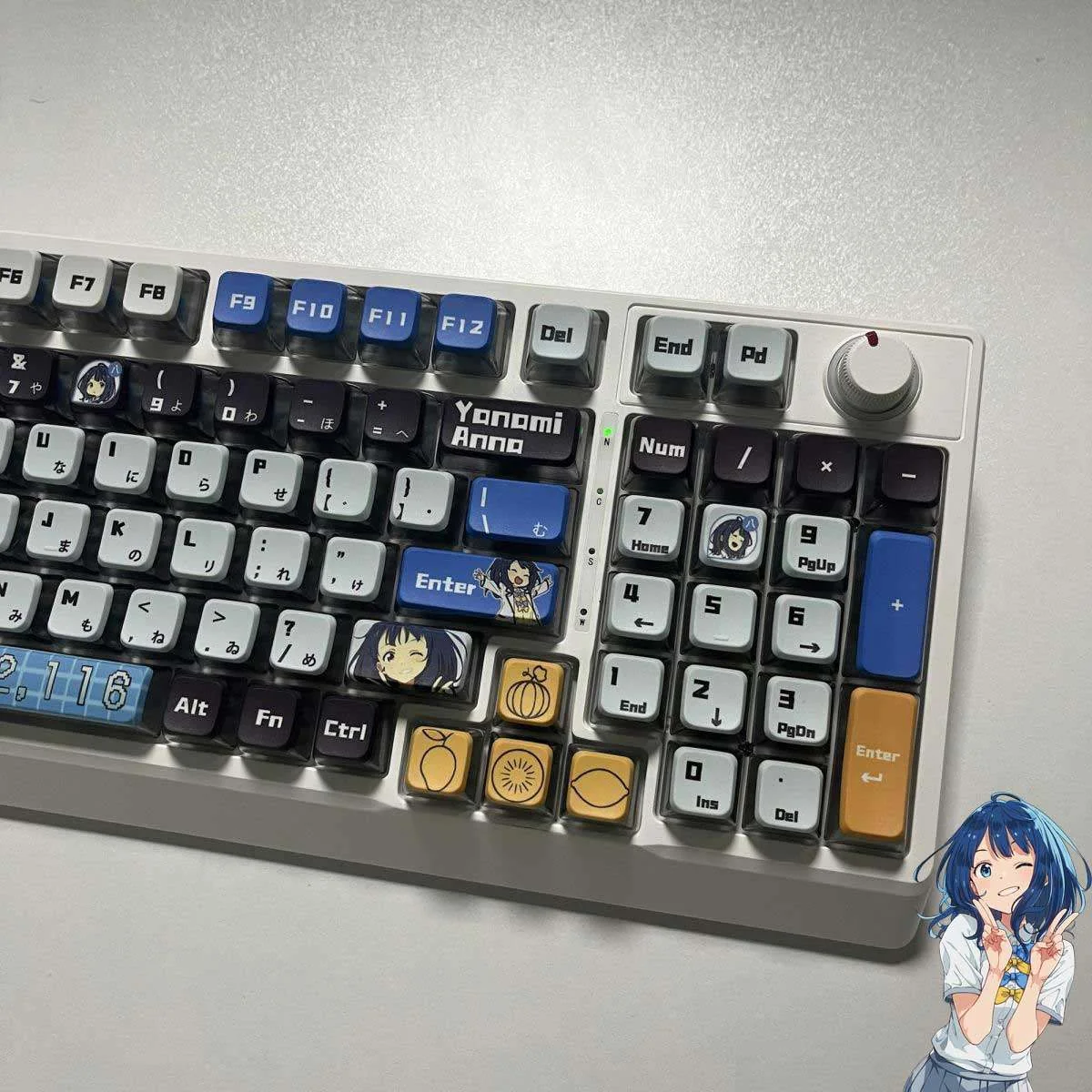 Close-up of the Anna Yanami translucent RGB anime keycaps set, vividly illuminating individual character art and the playful, personalized aesthetic.