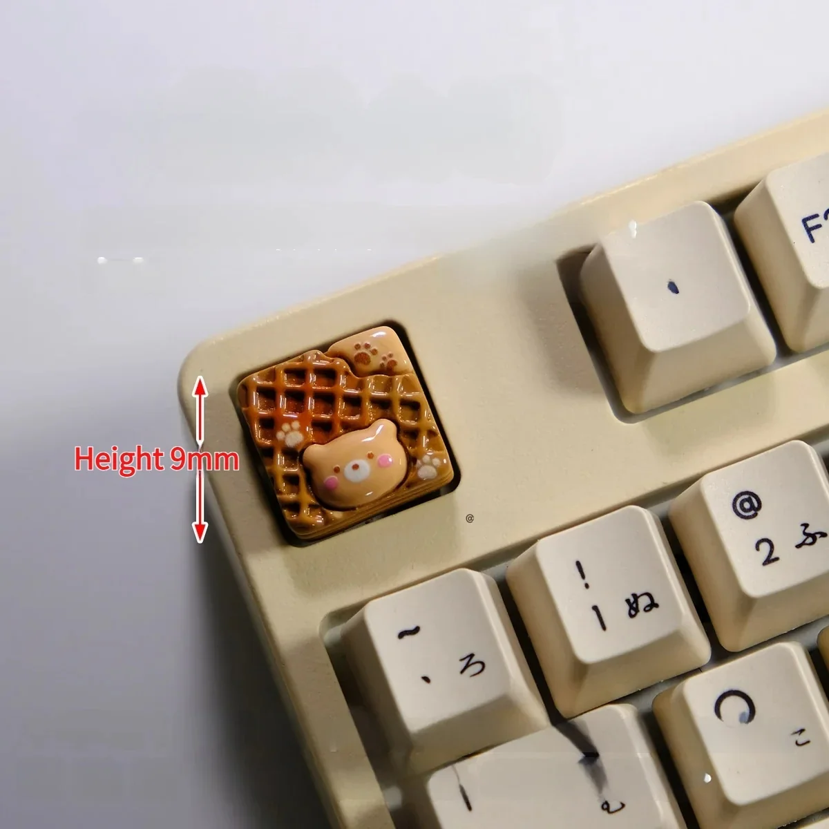 Handcrafted 3D bear waffle artisan keycap. Adorable chocolate brown design from multiple angles, showcasing its playful dessert aesthetic.